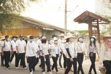 กองการศึกษาร่วมเดินรณรงค์ให้ประชาชนไปใช้สิทธิเลือกตั้ง